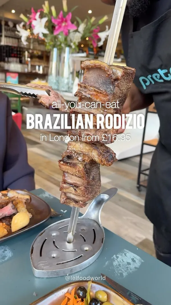 Have you tried a Brazilian Rodizio? This is your sign to have an UNLIMITED meat feast from £16.50 at @pretorestaurant 🇧🇷 
Over 16 cuts of succulent meats cooked on their churrasco (Brazilian BBQ) are carved table side by their Passadors onto your plates 🤤🙌 These are offered with a variety of freshly prepared gourmet salads and traditional Brazilian hot dishes as a buffet 🤩 You can get this all for only £16.95 as part of the lunch menu, or £28.95 any other time. The key is: don’t take too much of any one item or you’ll run out of space before you’ve tasted them all. Your favourite meats will be brought back around and you can keep feasting on these until you tell them you’re full! 
📍 @pretorestaurant has locations in Angel, Colchester, Putney, Queensway, Victoria and West End
.
.
.
#preto #unlimitedmeat #brazilianfood #brazilrodizio #rodizio #unlimitedfood #londonfoodguide #londonfood #londonfoodies #londonhotspots #secretlondon #cheapeats #cheapeatslondon #bottomlessbrunch #bottomlessbrunchlondon #meatlovers